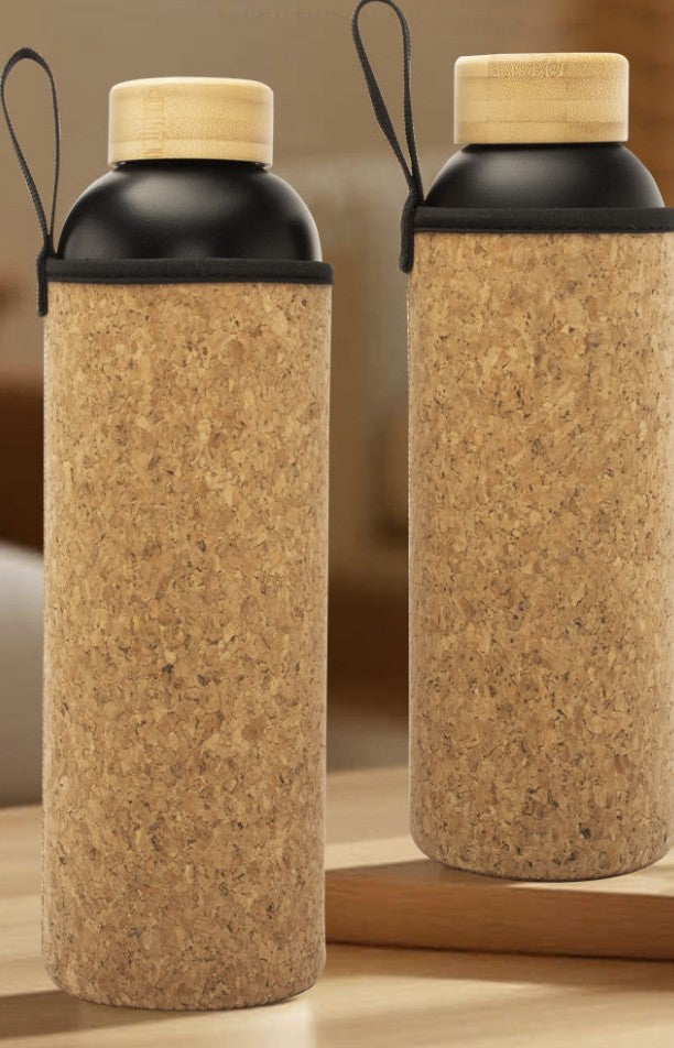 Two cork-covered insulated bottles with black necks and wood-finish lids